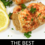 Cooked fish fillets with crabmeat stuffing, garnished with parsley and lemon slices.