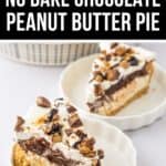 Two slices of Chocolate and Peanut Butter Pie topped with whipped cream and chopped peanut butter cups sit on white plates.