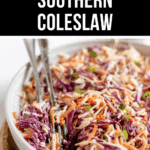 A bowl of creamy southern coleslaw with shredded cabbage, carrots, and green onions, with serving utensils placed inside. The text at the top reads "Creamy Southern Coleslaw Recipe.