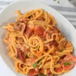 A shot of a bowl of the creamy bacon pasta.