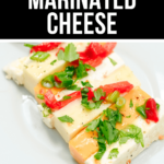 Indulge in this plate of marinated cheese, perfect for preparing ahead of time.