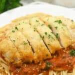 Slow cooker chicken parmesan with spaghetti.