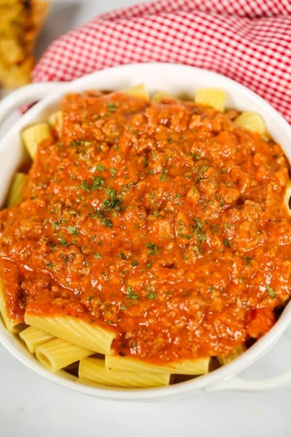 White bwl with easy bolognese sauce.