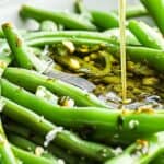 Italian Green Beans topped with olive oil and sprinkled with herbs and coarse salt.