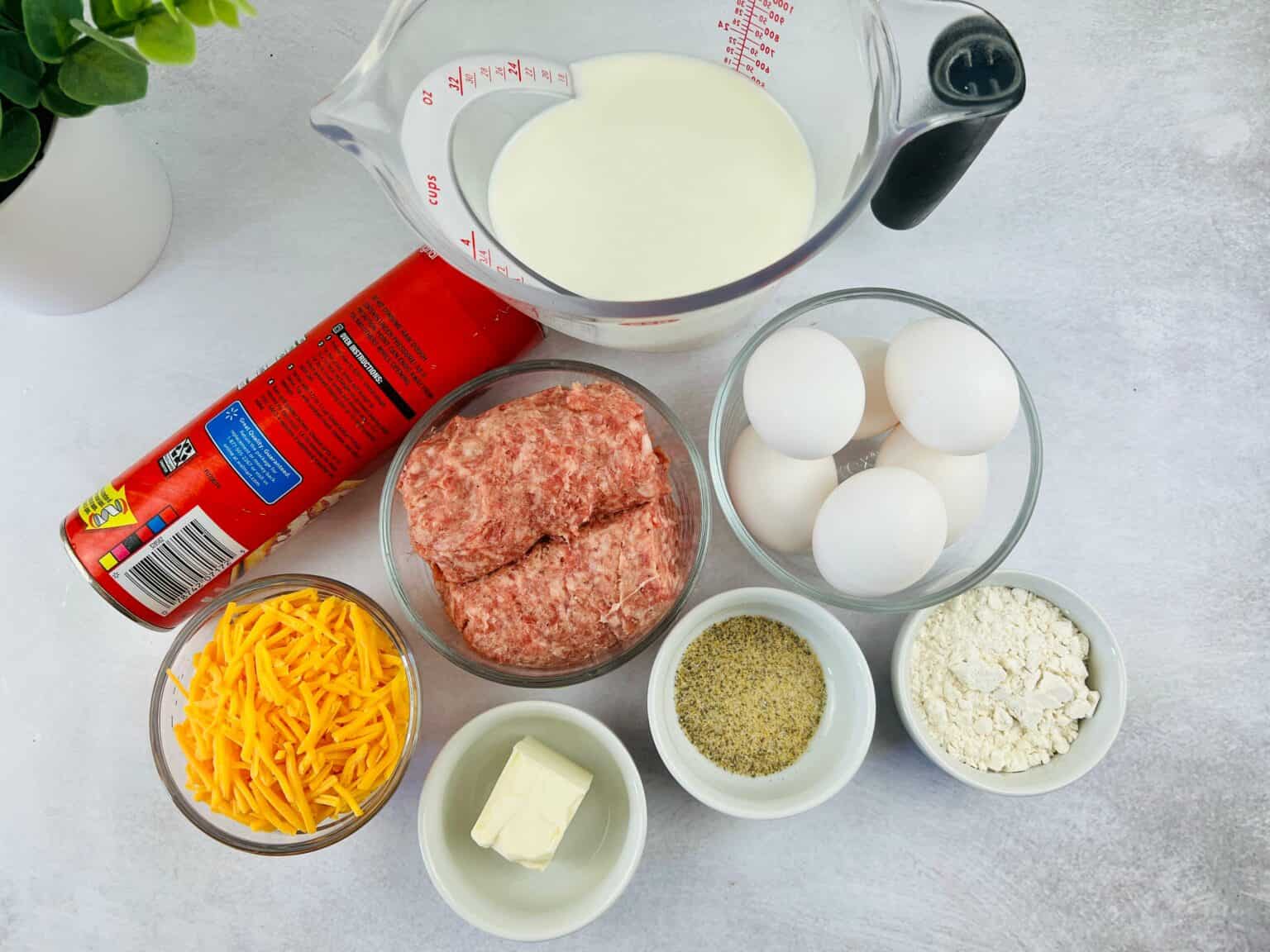 The sausage, eggs, cheese and dough to make the meal.