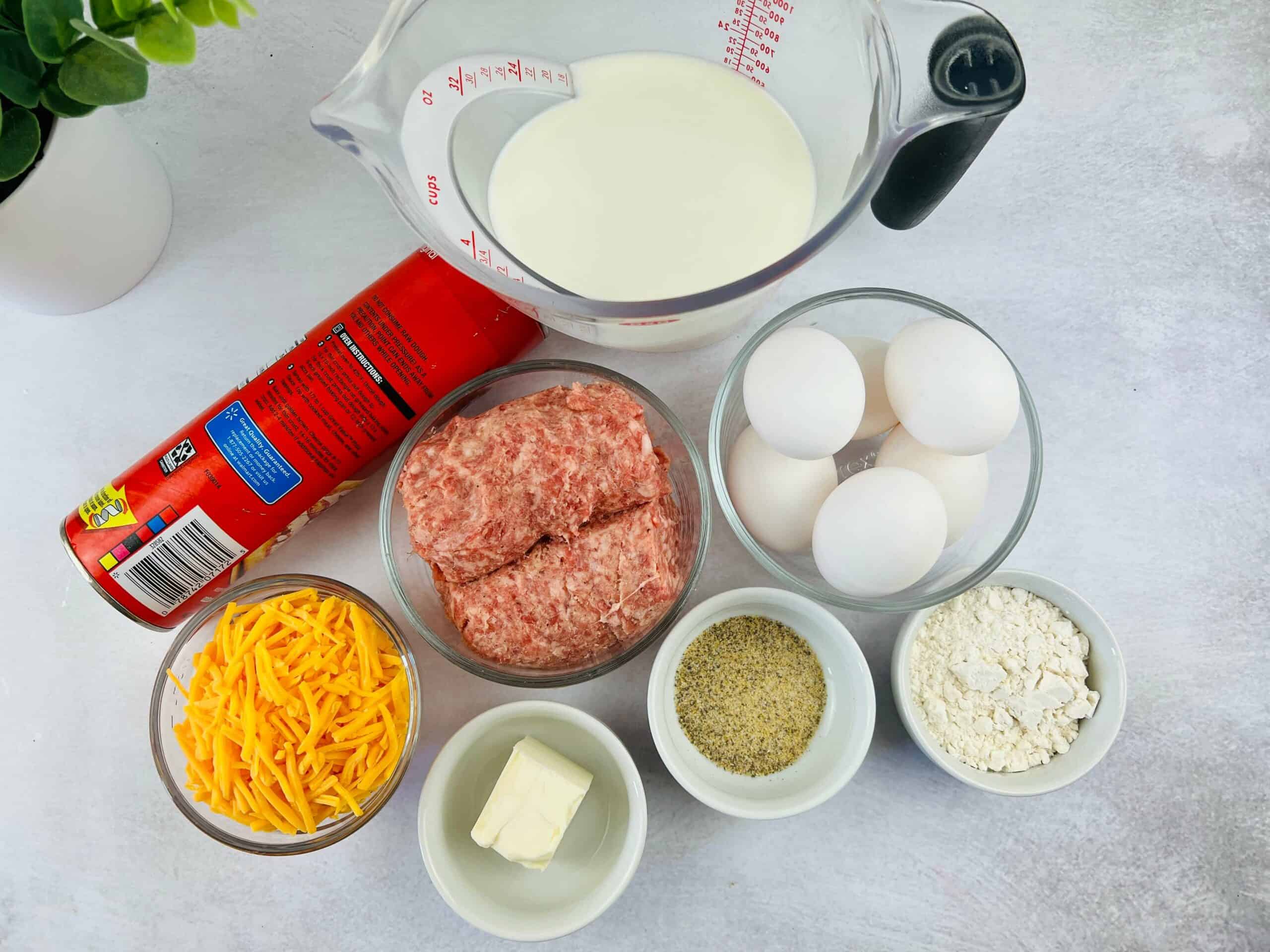 The sausage, eggs, cheese and dough to make the meal.