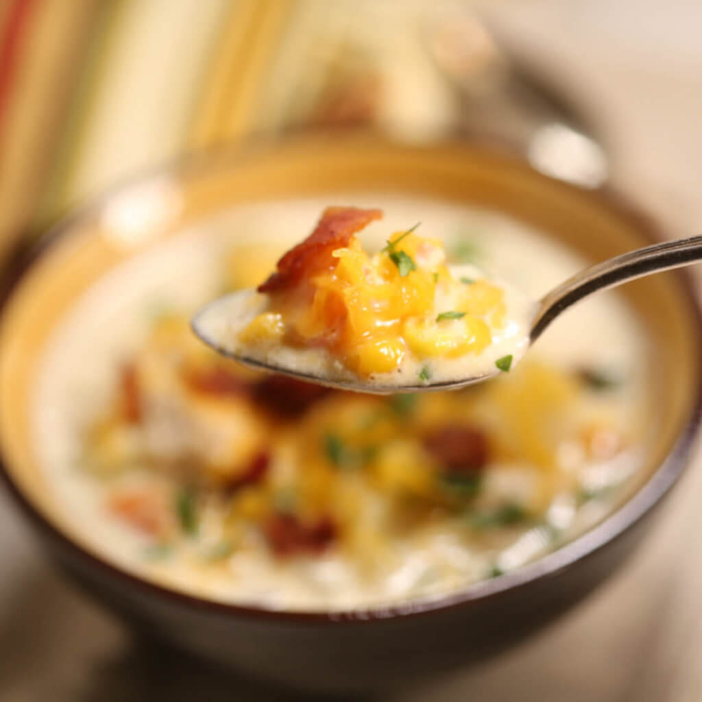 A spoonful of Chicken Corn Chowder Soup.