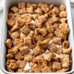 A baking dish filled with cinnamon toast crunch bars.