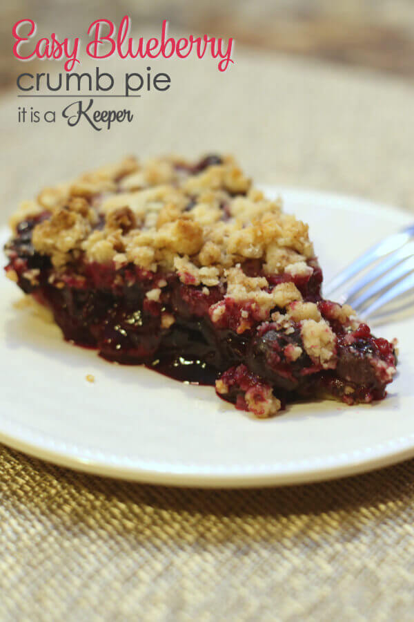 Blueberry Crumb Pie on a white plate.