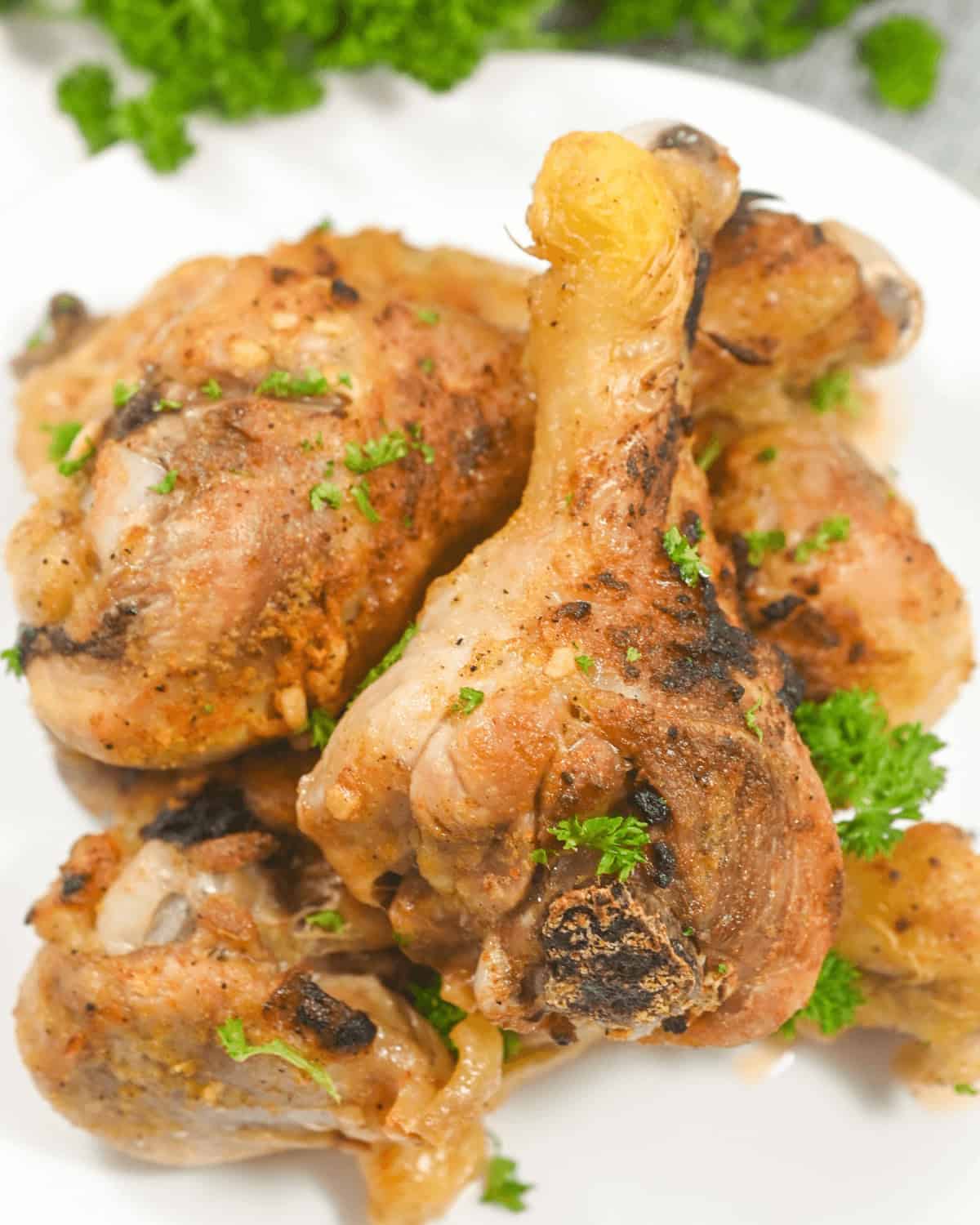 A close up view of the spicy roasted chicken legs.