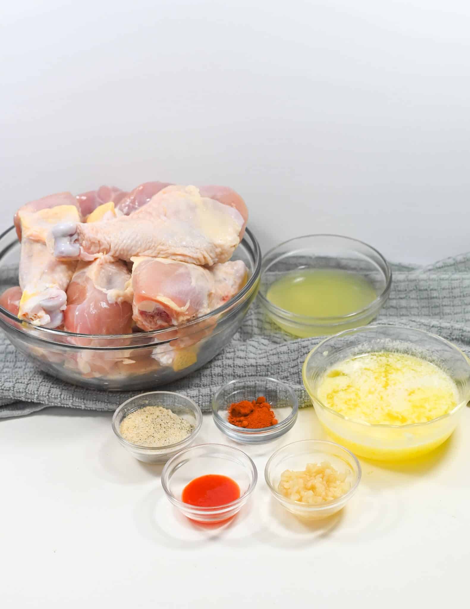 Sauce, seasoning and the meat in a bowl.