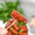 An appetizer on a toothpick.