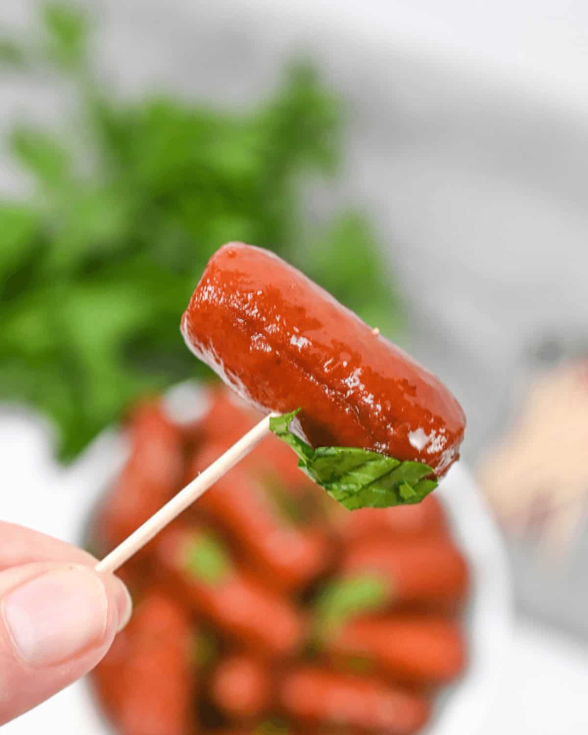 An appetizer on a toothpick.