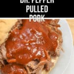 A plate with a sandwich containing tender Dr. Pepper pulled pork topped with barbecue sauce. Text above the image reads, "Slow Cooker Dr. Pepper Pulled Pork.