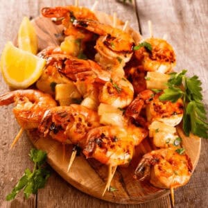 Beautiful Shrimp Skewers on a plate with lemon.