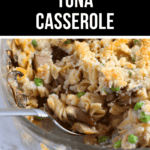 An old-fashioned tuna casserole with peas and a breadcrumb topping served in a glass dish.