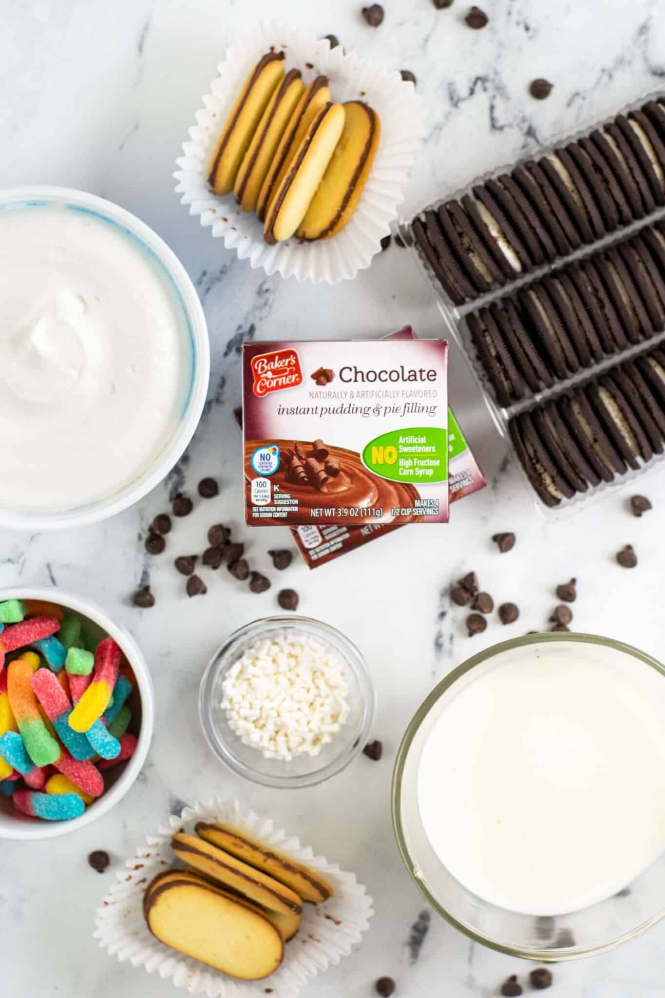 Candy, pudding, oreos and sprinkles.