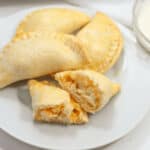 A plate with a plate of delicious hand pies.