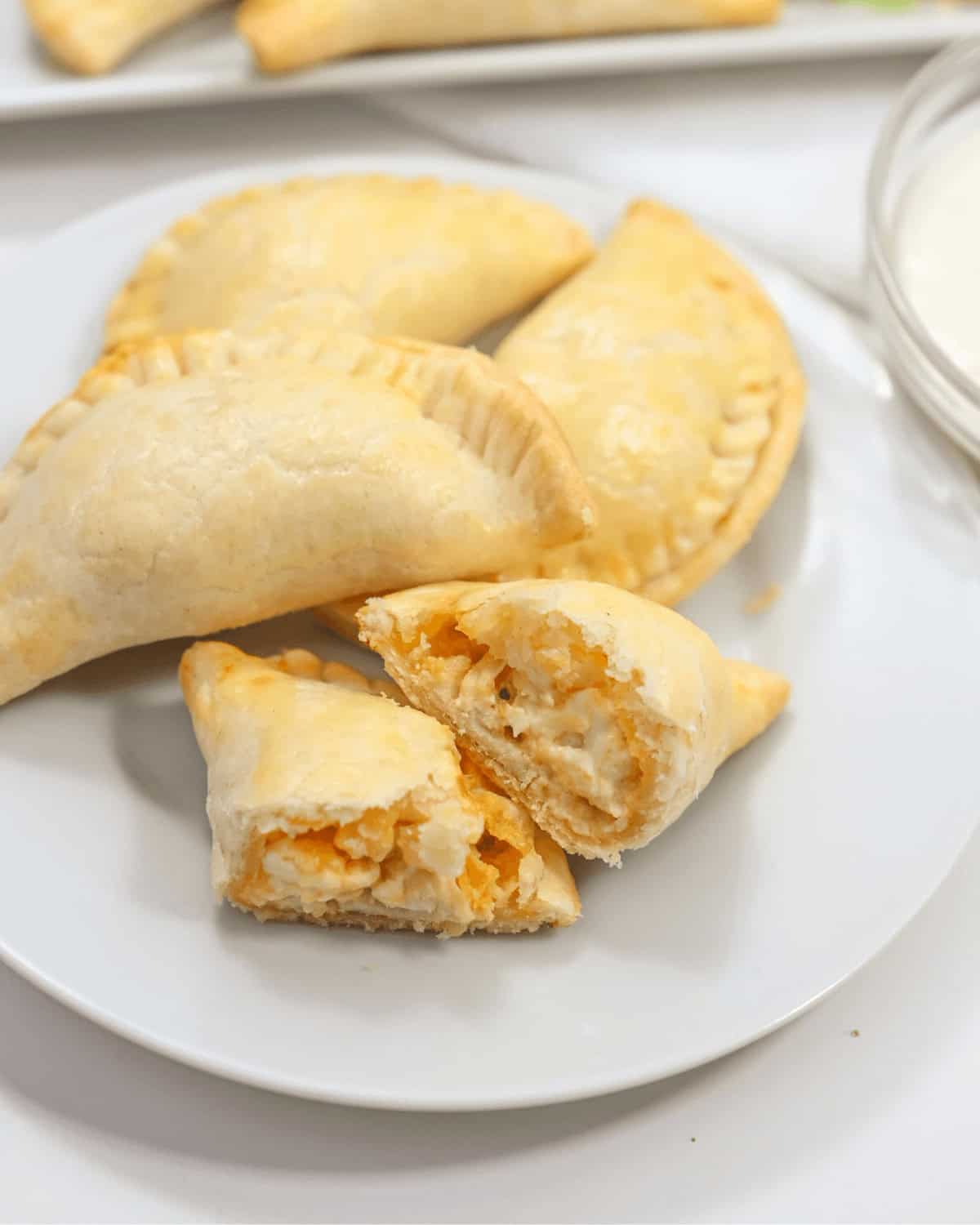 A plate with a plate of delicious hand pies.