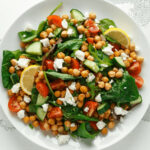 A heaping owl of chickpea and cucumber salad.