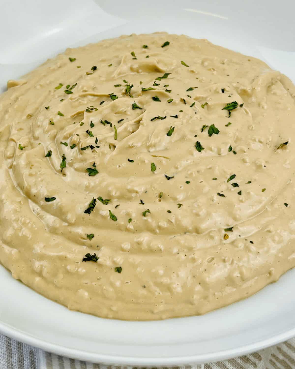 A bowl of the roasted garlic aioli.