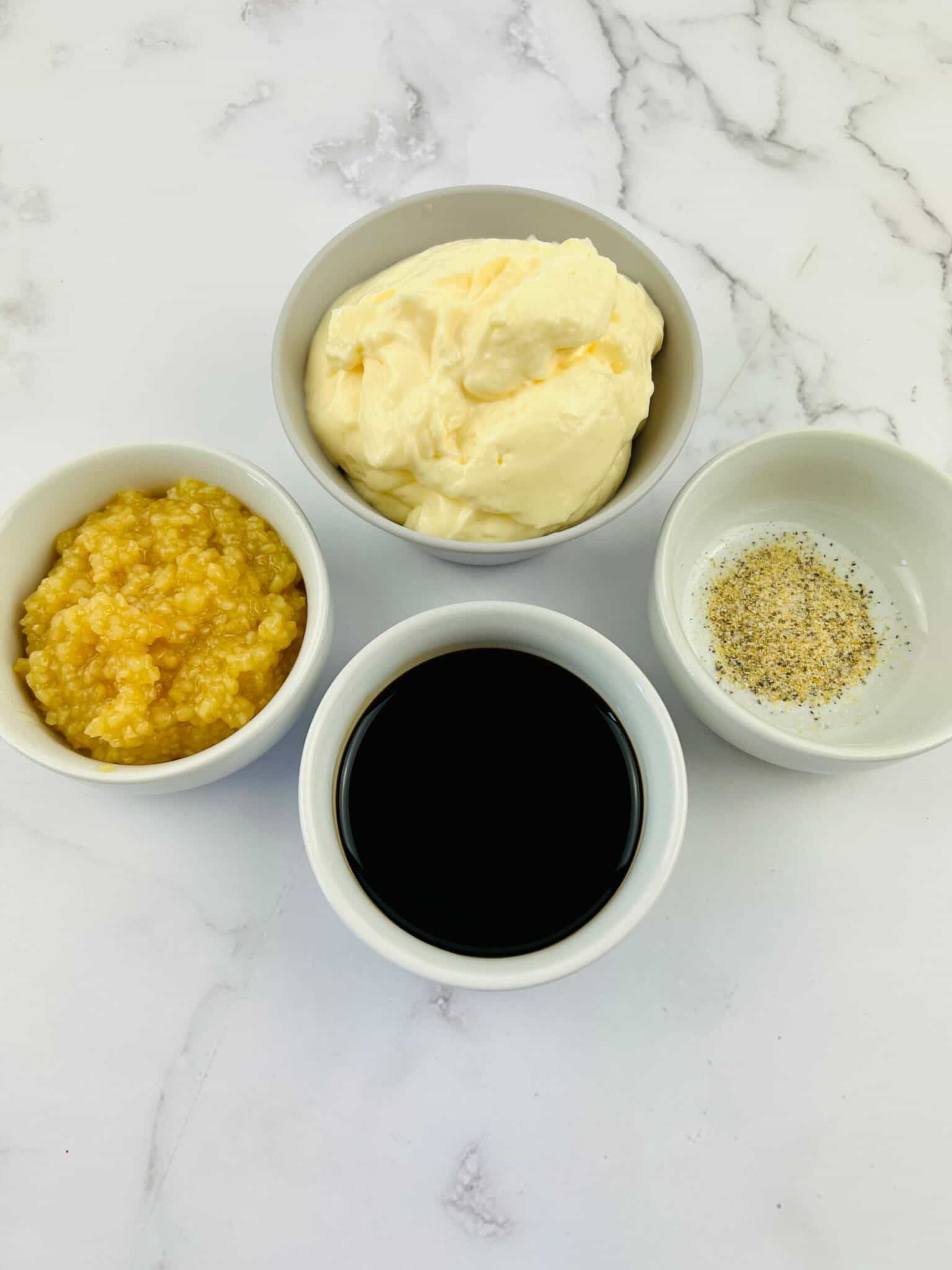 Oil, mayo and garlic to make the dish.