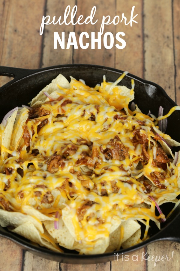 Slow Cooker Apple Bourbon Pulled Pork Nachos Recipe – an easy and delicious crock pot appetizer that is perfect for game day.