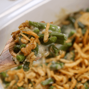 Crockpot Green Bean Casserole is a time saving twist on a classic Thanksgiving recipe. It's easy to put together and doesn't take up precious oven space on the big day.  It's definitely one of the best slow cooker recipes of all time. 