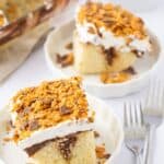 Several pieces of the butterfinger cake with a fork on the side.