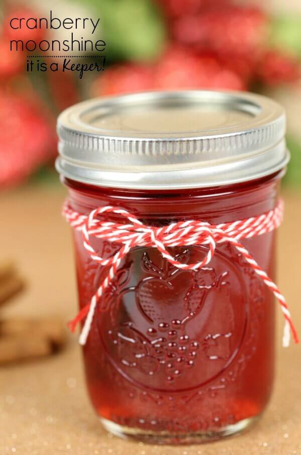 Cranberry Moonshine with twine around the jar.