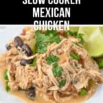 A plate of tender Slow Cooker Mexican Chicken, garnished with cilantro, black beans, and lime wedges, with text "Tender Slow Cooker Mexican Chicken" above.