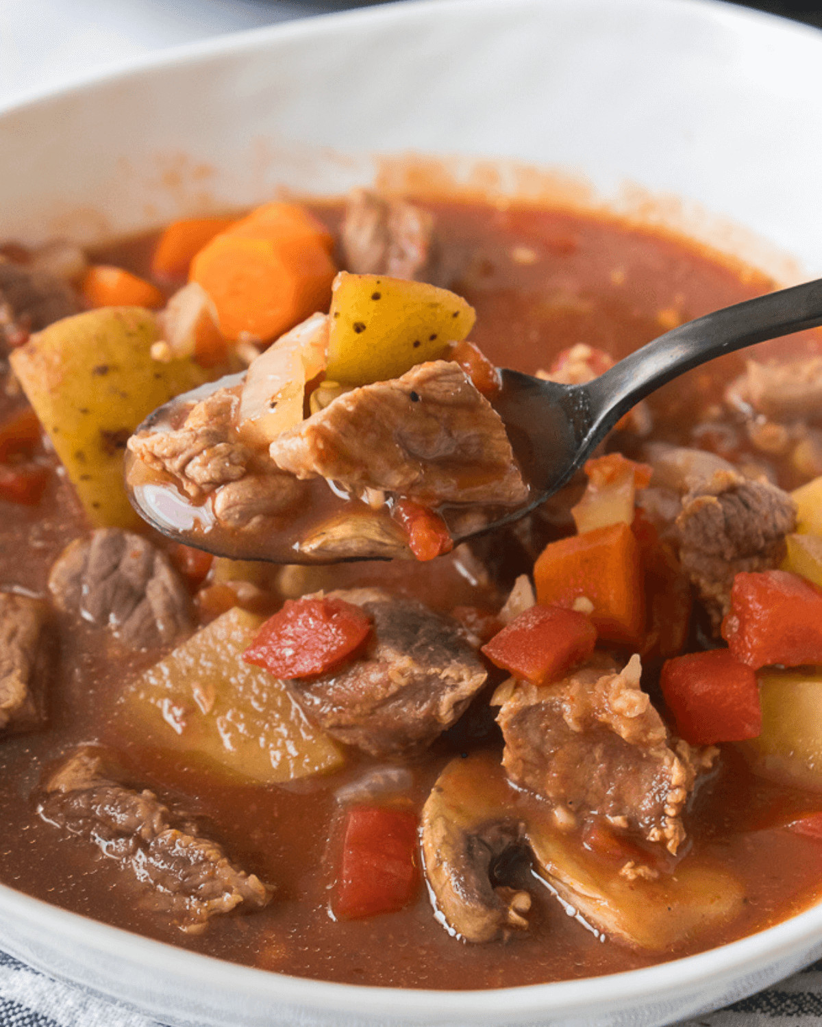 A hearty Crock Pot Beef Stew with tender meat and flavorful vegetables.