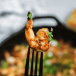 A fork with Caribbean jerked shrimp.