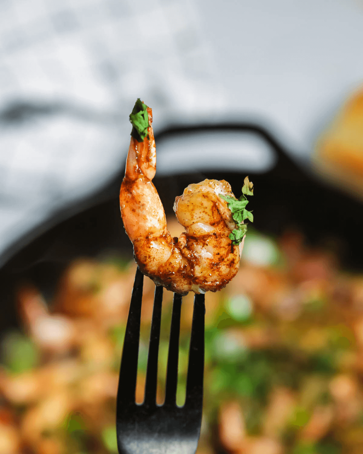 A fork with Caribbean jerked shrimp.