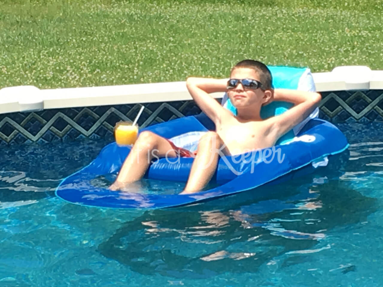 Kid on a pool float, with child on it. 