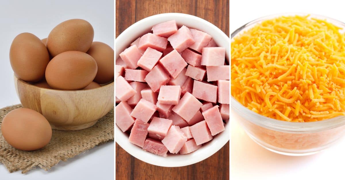 A wooden bowl of brown eggs, a white bowl of diced ham, and a glass bowl of shredded orange cheese are placed side by side. Perfect for making delicious ham and egg cups.