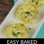A white rectangular plate with three delicious ham and egg cups topped with fresh herbs. "Easy Baked Ham and Egg Cups" text is displayed at the bottom.