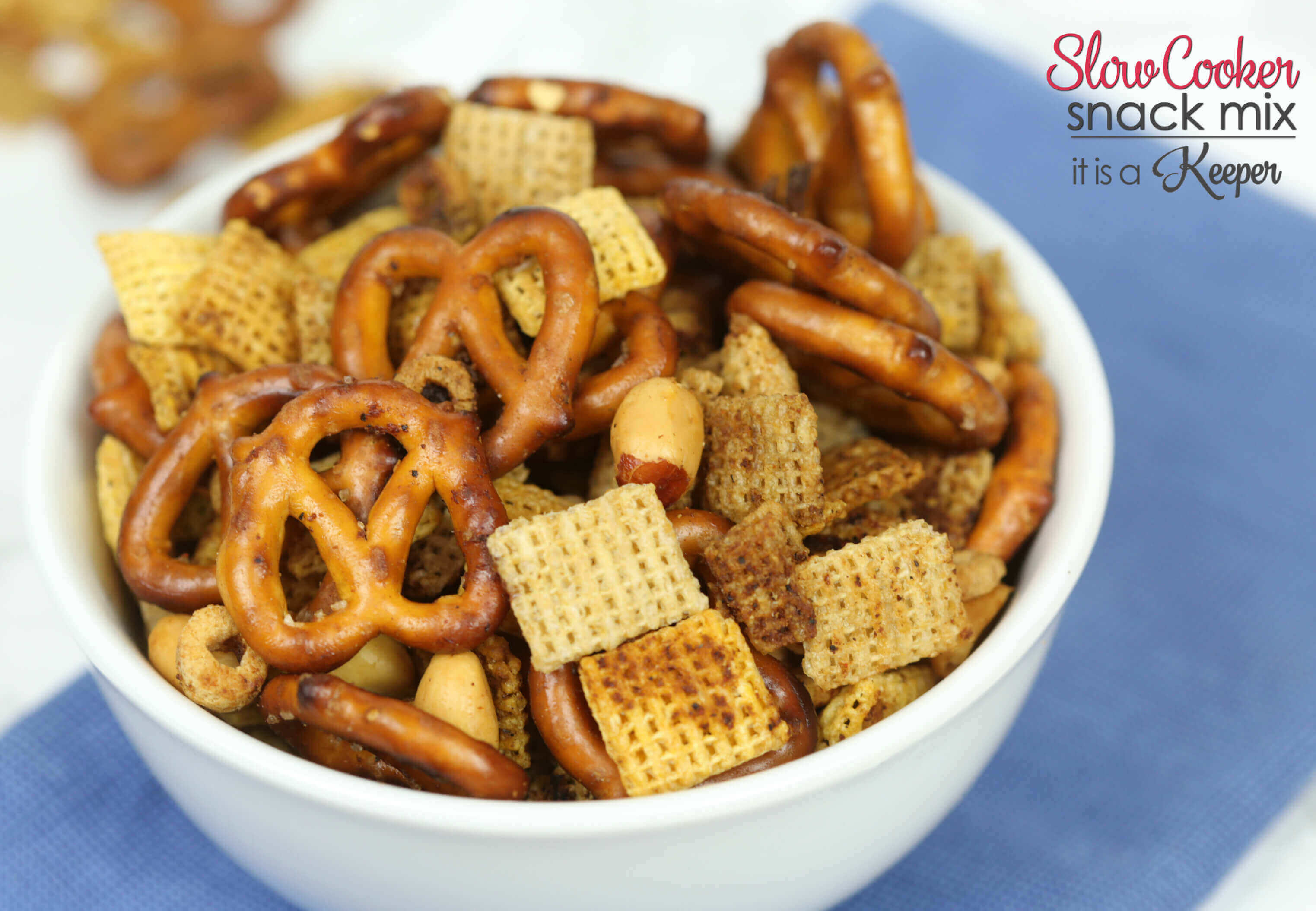 This Slow Cooker Party Snack Mix is one of my favorite easy Crock-Pot® slow cooker recipes. It's super delicious and one of the best slow cooker recipes of all time.