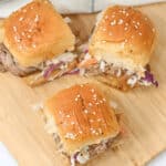 A cutting board of the sandwiches.