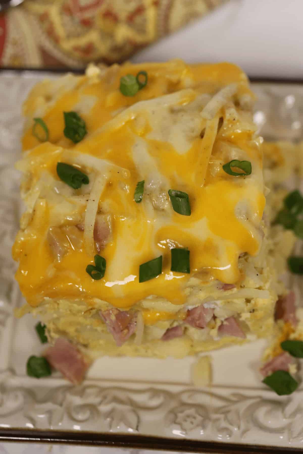 A crock pot breakfast casserole on a plate.