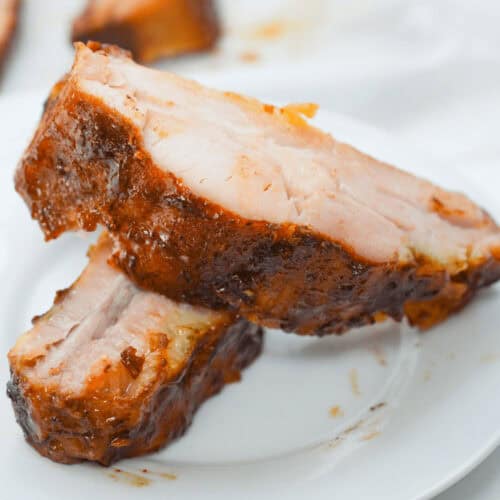 Slow Cooker beef ribs on a white plate.