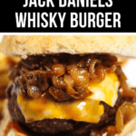A close-up of a grilled Whiskey Burger with melted cheese and caramelized onions in a bun.