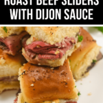 Tasty roast beef sliders drizzled with duon sauce.