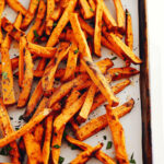 A tray of baked sweet potato fries.