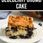 A slice of Blueberry Crumb Cake on a plate with a delicious crumble topping.