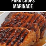 Grilled Pork Chops Marinade: Tender grilled pork chops topped with a savory marinade sauce, displayed on a pristine white plate.