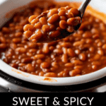 A spoonful of baked beans is held over a pot brimming with delicious crock pot baked beans. Text below reads, "Sweet & Spicy Crock Pot Baked Beans.