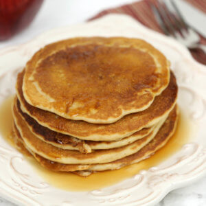 Apple Cider Pancakes - these cider infused pancakes are drizzled with a luscious cider syrup