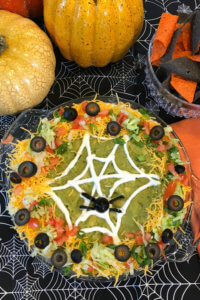 Halloween Taco Dip - this easy taco dip recipe takes minutes to make and is a great Halloween recipe for parties