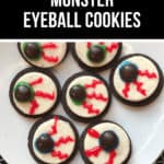Seven eyeball cookies, adorned with icing to resemble monster eyes, boast red veins and chocolate centers. They rest on a dark spiderweb-patterned background, creating the perfect spooky treat.